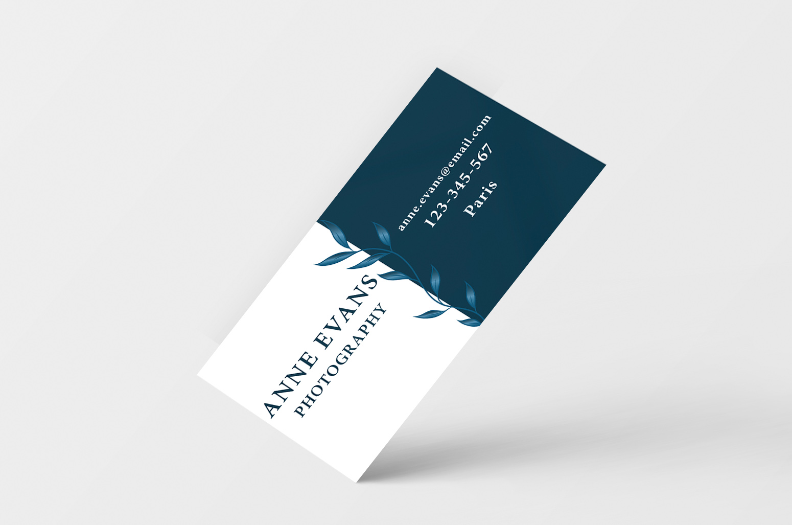 graphic design mockup business card dark blue with leaves